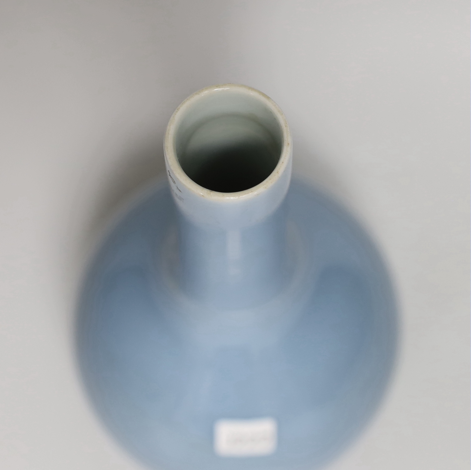 A Chinese Claire du lune glazed bottle vase, housed in a fitted case, 27cm high